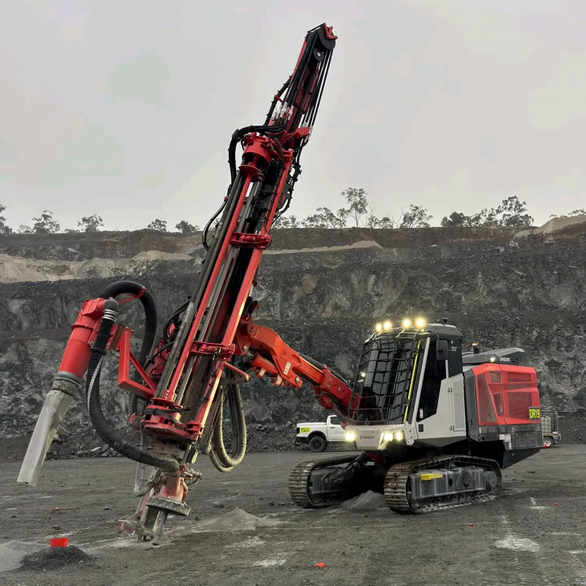 Conventional mine drill rig working in an open-pit mine
